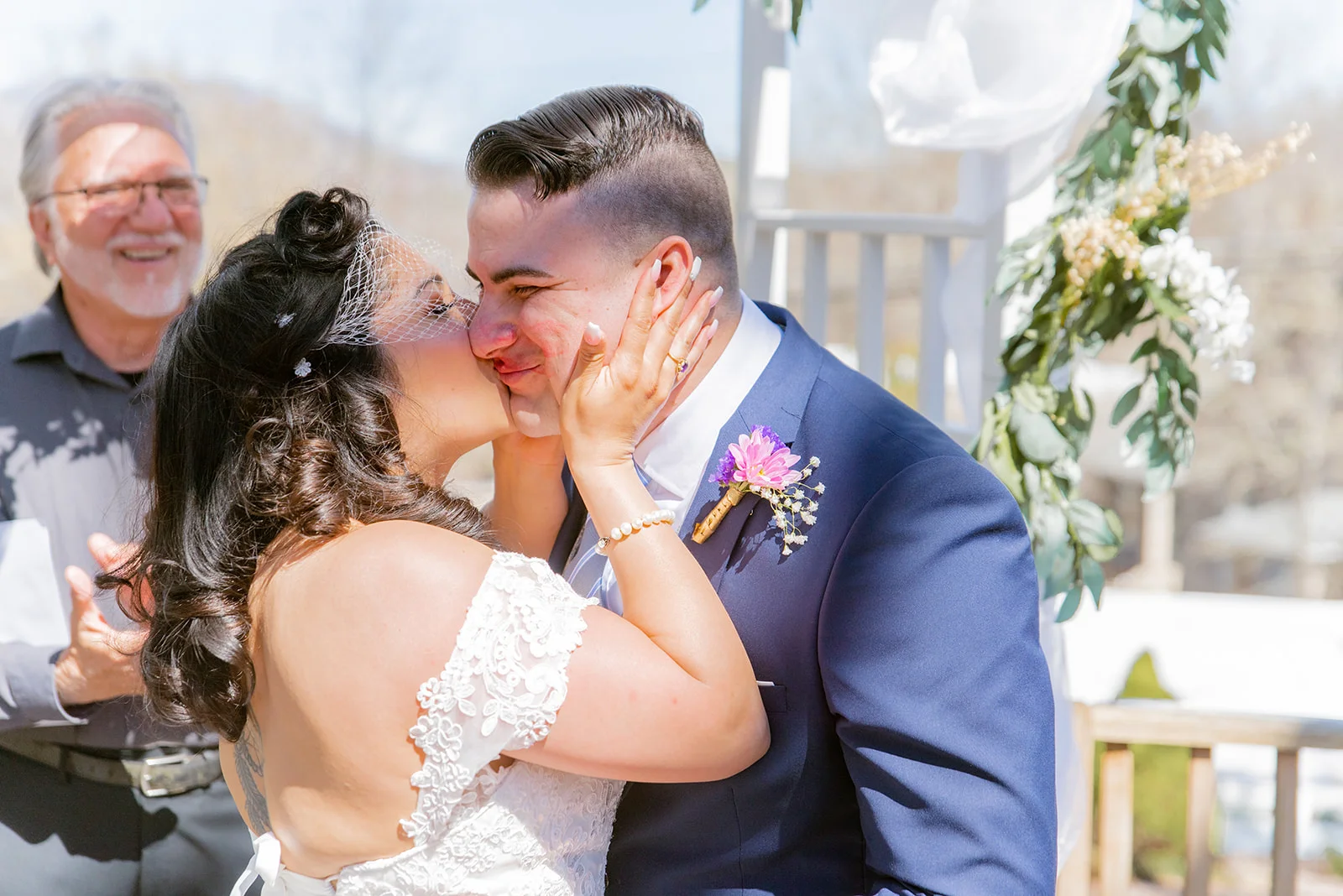 Bride and groom kissing