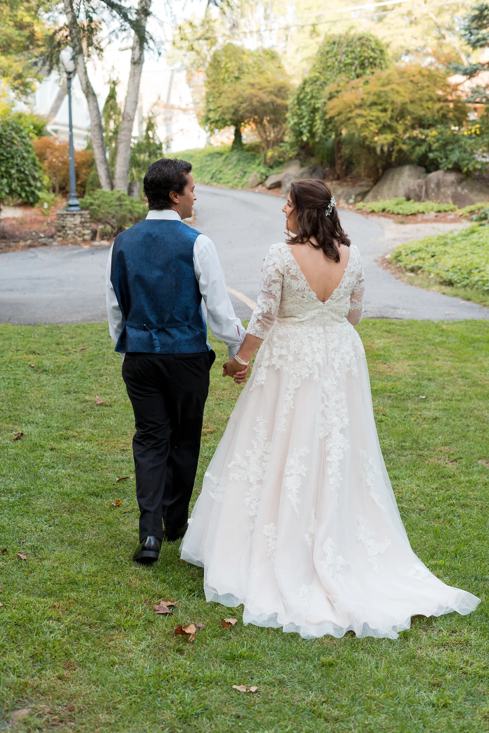 Wedding couple with backs to camera